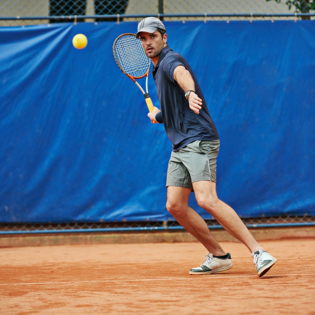 Here it comes. Shot of a tennis player during a match.
